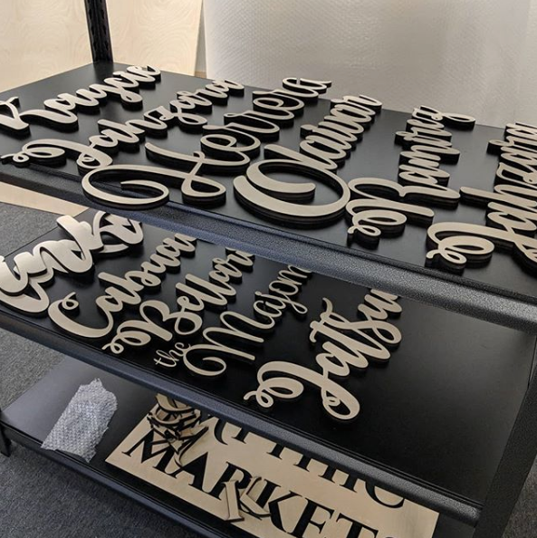 Several Custom Wood Signs